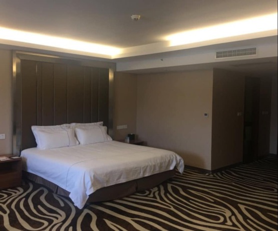 Imagen de la habitación del Hotel Melody Hotel (Xi'an Dachaishi Metro Station). Foto 10