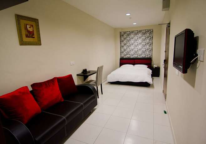 Imagen de la habitación del Hotel Melody Inn. Foto 2