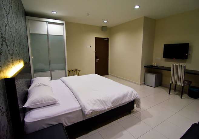 Imagen de la habitación del Hotel Melody Inn. Foto 3