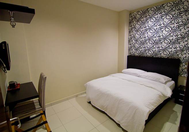 Imagen de la habitación del Hotel Melody Inn. Foto 4