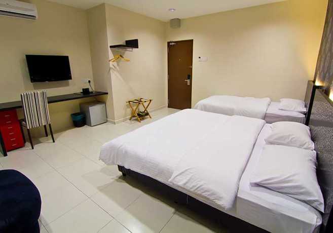 Imagen de la habitación del Hotel Melody Inn. Foto 6