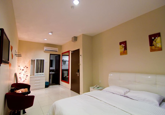 Imagen de la habitación del Hotel Melody Inn. Foto 7