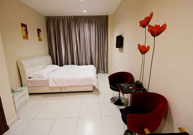 Imagen de la habitación del Hotel Melody Inn. Foto 8