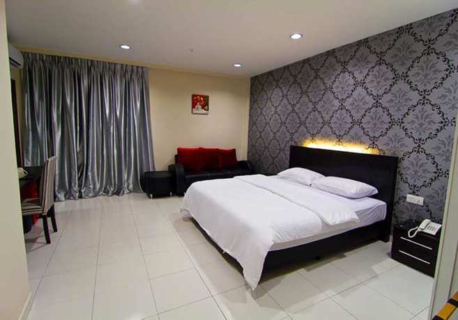 Imagen de la habitación del Hotel Melody Inn. Foto 9