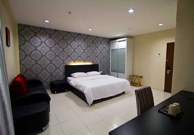 Imagen de la habitación del Hotel Melody Inn. Foto 10