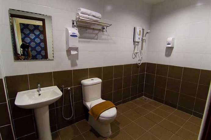 Imagen de la habitación del Hotel Melody Inn. Foto 12