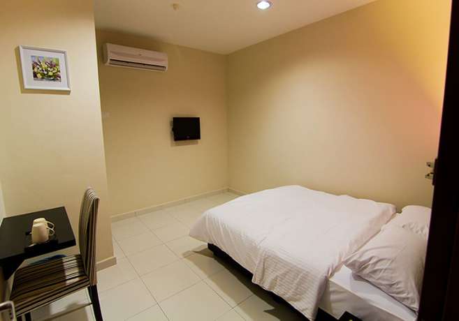 Imagen de la habitación del Hotel Melody Inn. Foto 13