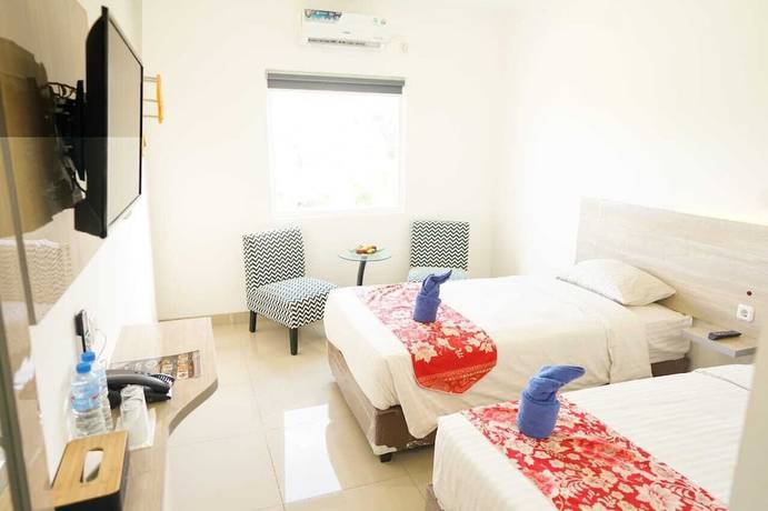 Imagen de la habitación del Hotel Mel\'s Inn Manado. Foto 7