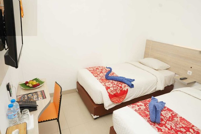 Imagen de la habitación del Hotel Mel\'s Inn Manado. Foto 9