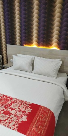 Imagen de la habitación del Hotel Mel\'s Inn Manado. Foto 10