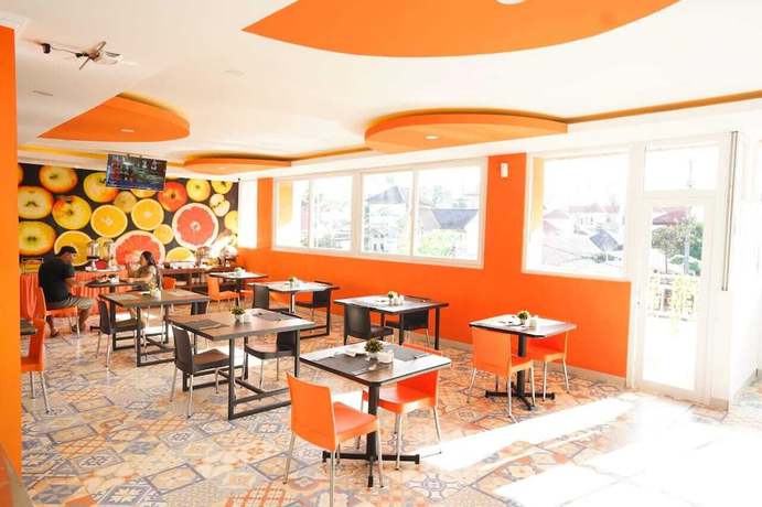 Imagen del bar/restaurante del Hotel Mel\'s Inn Manado. Foto 4