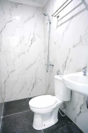 Imagen de la habitación del Hotel Mel\'s Inn Manado. Foto 15
