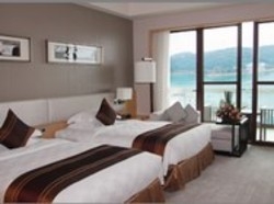 Imagen de la habitación del Hotel Mels Weldon Evergreen Lake Heyuan. Foto 4