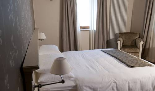 Imagen de la habitación del Hotel Meltar Boutique. Foto 13