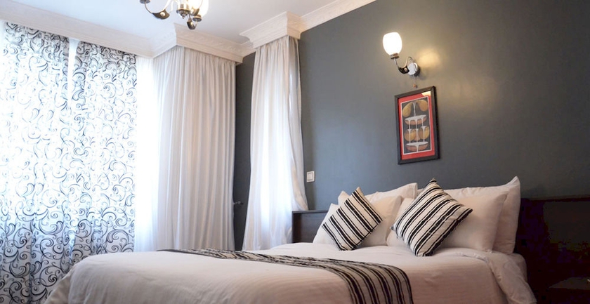 Imagen de la habitación del Hotel Meltonia Luxury Suites. Foto 10