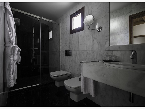 Imagen de la habitación del Hotel Melva Suite. Foto 7