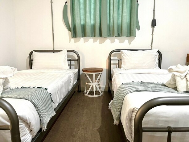 Imagen de la habitación del Hotel Memmoth Hostel In Lampang. Foto 14