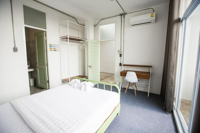 Imagen de la habitación del Hotel Memmoth Hostel In Lampang. Foto 16