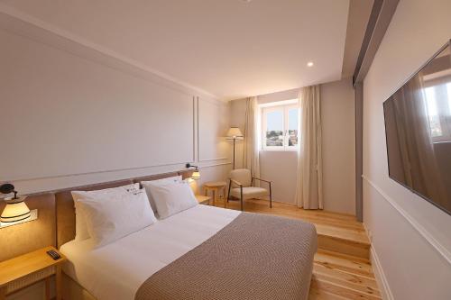 Imagen de la habitación del Hotel Memoria Porto Flh Hotels. Foto 11