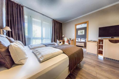 Imagen de la habitación del Hotel MenDan Magic Spa & Wellness. Foto 6