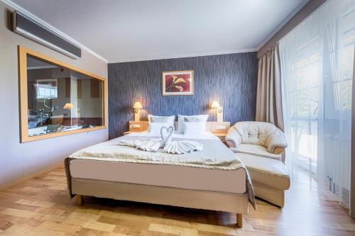 Imagen de la habitación del Hotel MenDan Magic Spa & Wellness. Foto 7