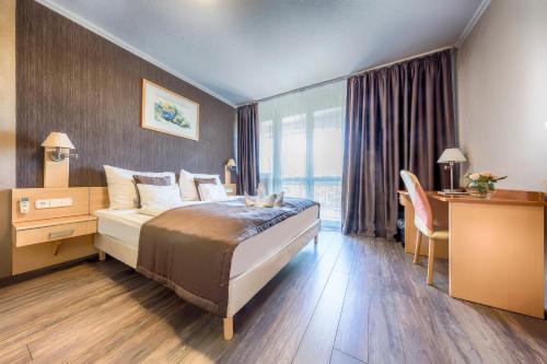 Imagen de la habitación del Hotel MenDan Magic Spa & Wellness. Foto 9