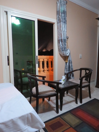 Imagen de la habitación del Hotel Mena Inn Pyramids. Foto 9