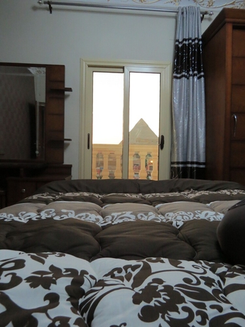 Imagen de la habitación del Hotel Mena Inn Pyramids. Foto 10