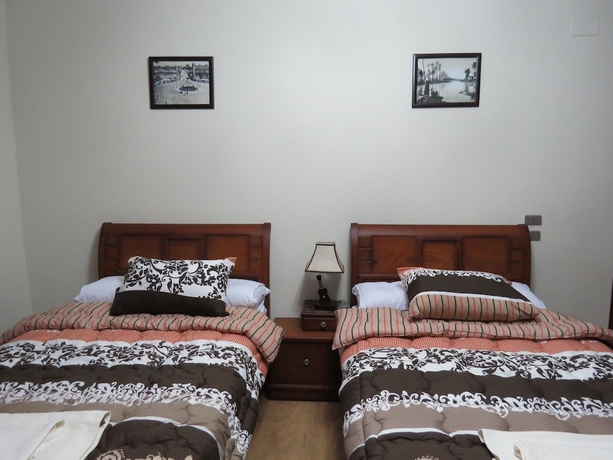 Imagen de la habitación del Hotel Mena Inn Pyramids. Foto 11