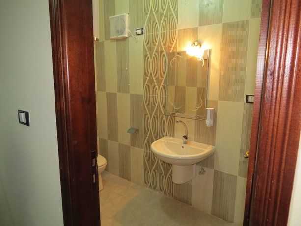 Imagen de la habitación del Hotel Mena Inn Pyramids. Foto 17