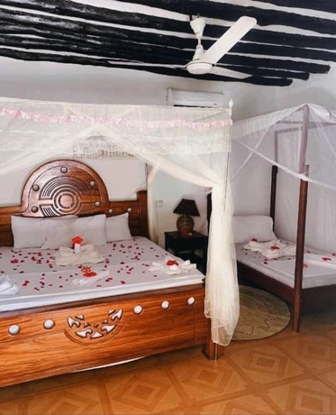 Imagen de la habitación del Hotel Menai Bay Beach Bungalows, Unguja Ukuu Kaepwani. Foto 8