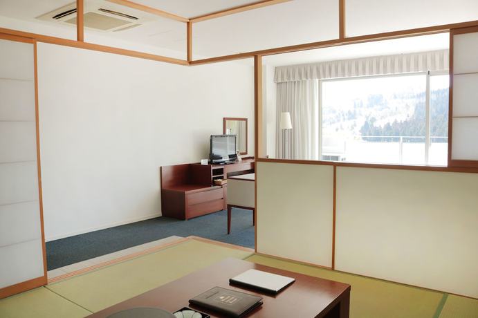 Imagen de la habitación del Hotel Menard Aoyama Resort Sch&ouml;nvert. Foto 9