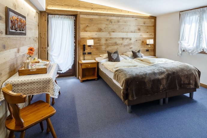 Imagen de la habitación del Hotel Menardi. Foto 10