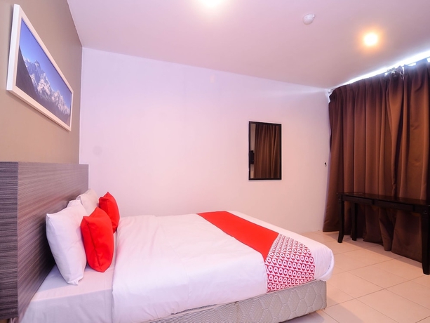 Imagen de la habitación del Hotel Mendu Inn. Foto 8