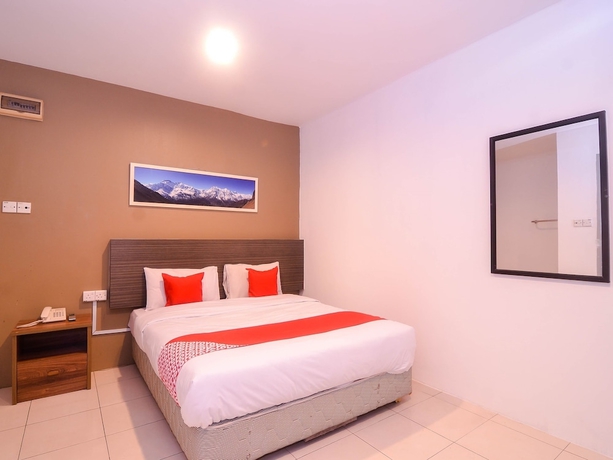 Imagen de la habitación del Hotel Mendu Inn. Foto 9