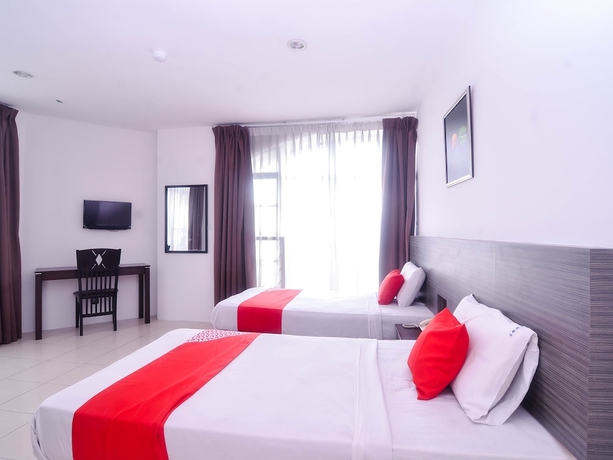 Imagen de la habitación del Hotel Mendu Inn. Foto 10