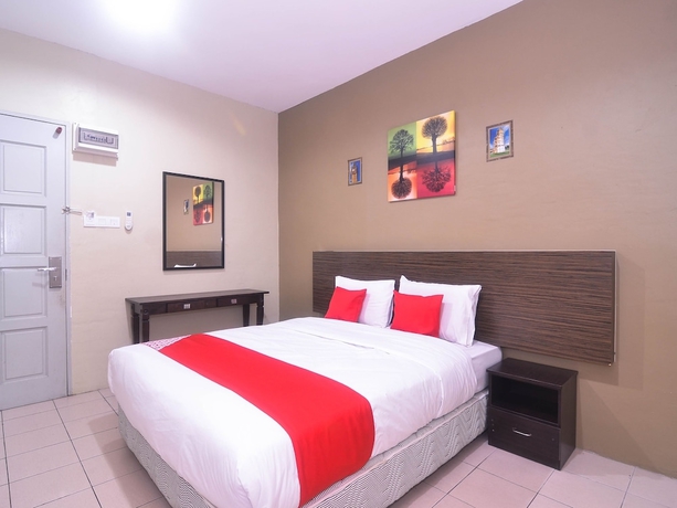Imagen de la habitación del Hotel Mendu Inn. Foto 12