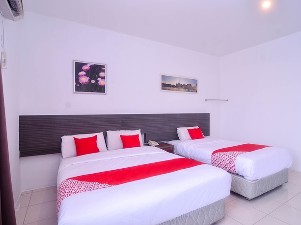 Imagen de la habitación del Hotel Mendu Inn. Foto 13