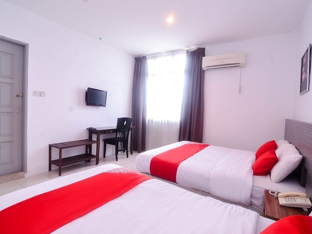 Imagen de la habitación del Hotel Mendu Inn. Foto 14