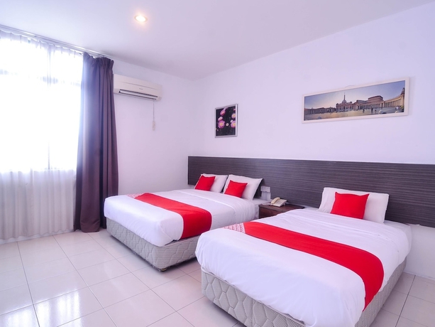 Imagen de la habitación del Hotel Mendu Inn. Foto 15