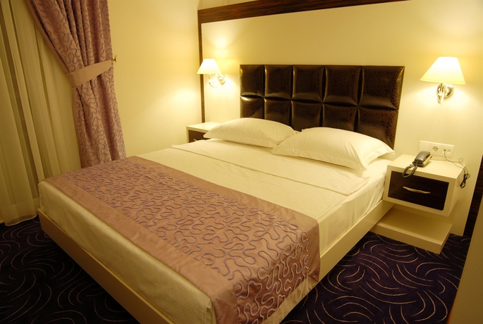 Imagen de la habitación del Hotel Mene City. Foto 9