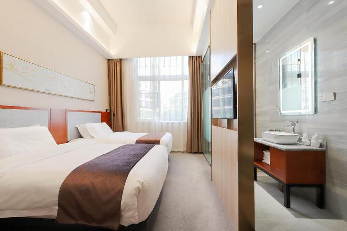Imagen de la habitación del Hotel Mengguo Pudong Airport Plaza. Foto 5