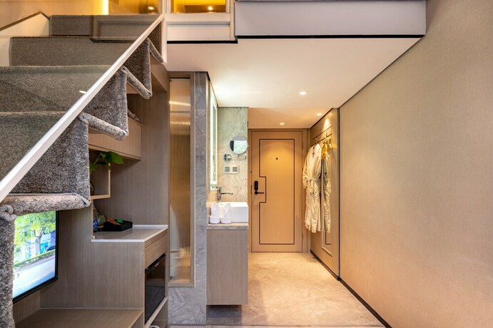 Imagen de la habitación del Hotel Mengguo Wisdom. Foto 2