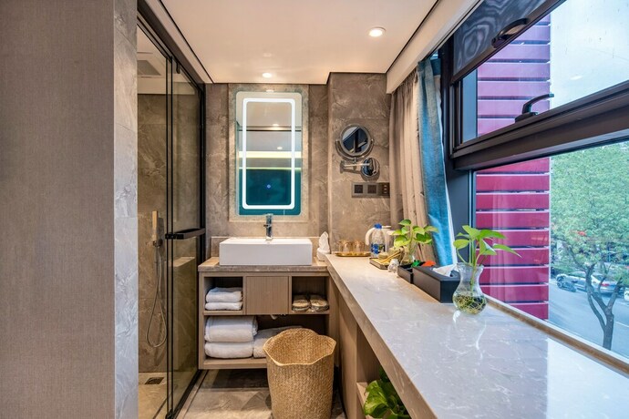 Imagen de la habitación del Hotel Mengguo Wisdom. Foto 4