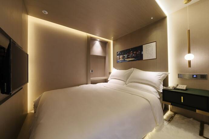 Imagen de la habitación del Hotel Mengguo Wisdom. Foto 5