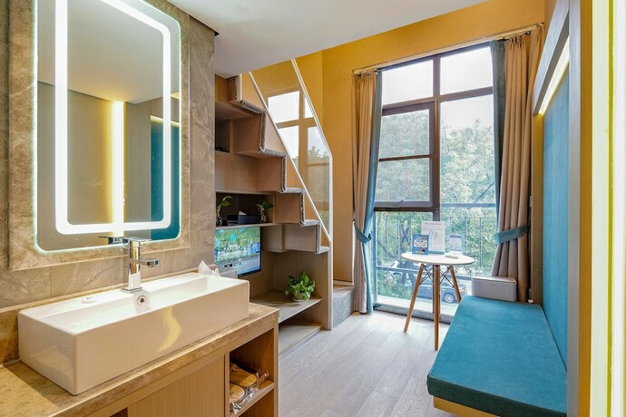 Imagen de la habitación del Hotel Mengguo Wisdom. Foto 7