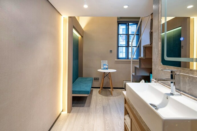 Imagen de la habitación del Hotel Mengguo Wisdom. Foto 12