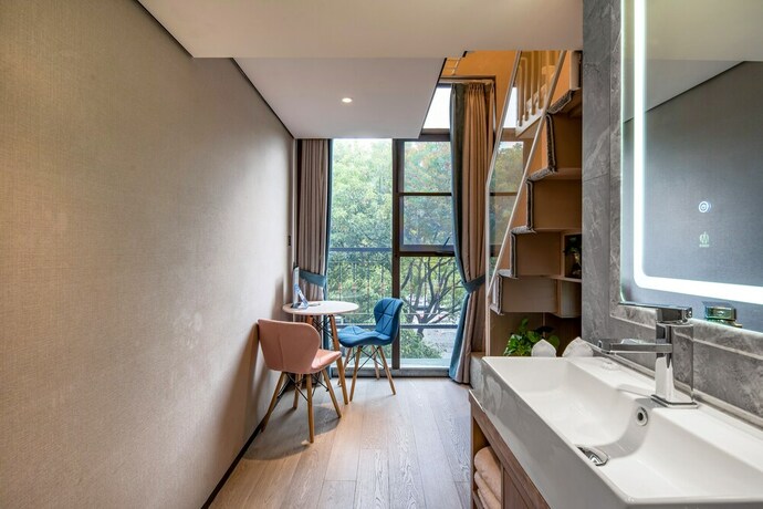 Imagen de la habitación del Hotel Mengguo Wisdom. Foto 14