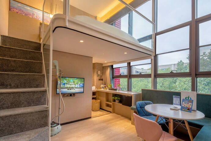 Imagen de la habitación del Hotel Mengguo Wisdom. Foto 15