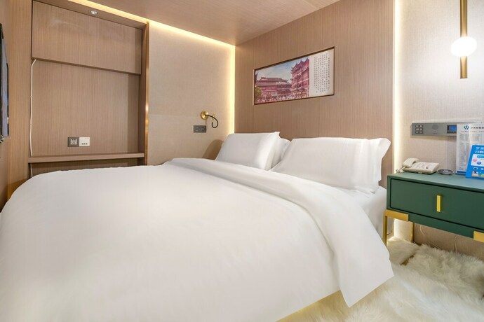 Imagen de la habitación del Hotel Mengguo Wisdom. Foto 16